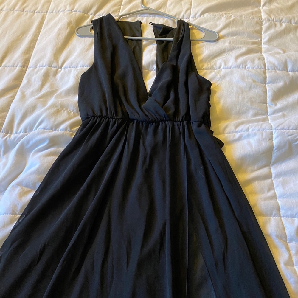 Little black dress, with slit.